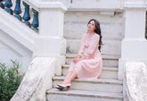 Silk midi dress with ruffle neckline and smocked cuffs for a romantic vintage-inspired look